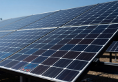 SolarGrid Dynamics Logo - Close up of solar panels